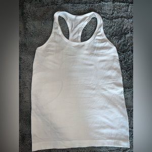 Lululemon size 6 white tank top.
